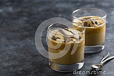 Affogato with Ice Cream, coffee glass with whipped milk, dark background Stock Photo