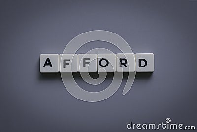 Afford word made of square letter word on gray background Stock Photo