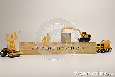 affordability analysis written on wooden surface. Finance and mortgage Stock Photo