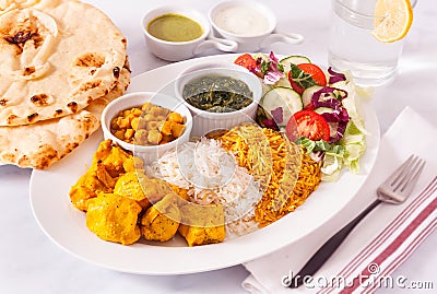 Afghan Chicken Kabob Food Platter with Naan Bread Stock Photo