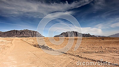 Afghanistan landscape, desert plain against the backdrop of mountains Stock Photo