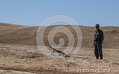 Afghanistan weapon training in the desert in the middle fighting season Editorial Stock Photo
