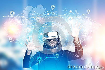 Afircan American man in a hoodie in vr glasses Stock Photo