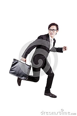 Afraid businessman running away Stock Photo