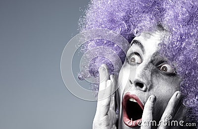 Afraid clown Stock Photo