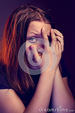 Afraid teen girl Stock Photo