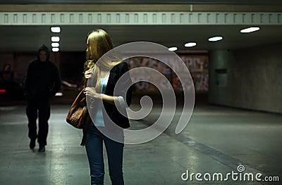 Afraid woman in the subway Stock Photo