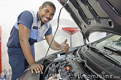 African-American Auto Tech Gives Thumbs Up Stock Photo