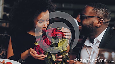 African American Couple Dating in Restaurant Stock Photo