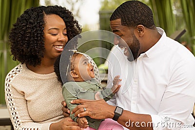 Happy African American family with their baby. Stock Photo