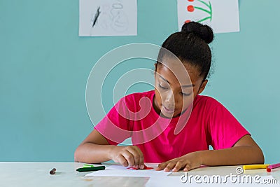 African American girl doing arts in school Stock Photo