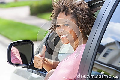 African American Girl Woman Thumbs Up Driving Car Stock Photo