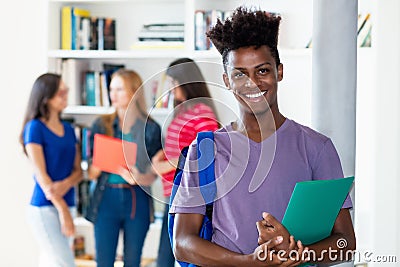 African american male student with group of multi ethnic college students Stock Photo