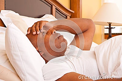 African American man having trouble sleeping. Stock Photo