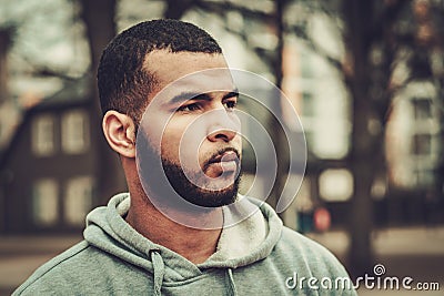 African-american man wearing hoodie outdoors Stock Photo