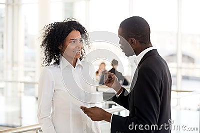 African american mentor ceo explaining helping mixed-race intern Stock Photo