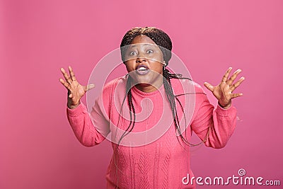 African american model feeling frustrated and aggressive while posing in studio Stock Photo