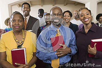 African American People With Bibles In Church Stock Photo