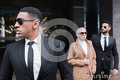 african american security man in sunglasses Stock Photo