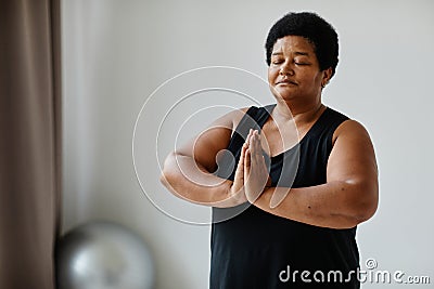 African American Senior Woman Meditating Eyes Closed Stock Photo