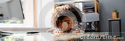 African American Sneaky Man Avoiding Work Stock Photo