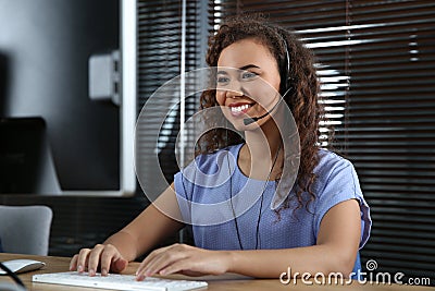 African-American technical support operator with headset Stock Photo