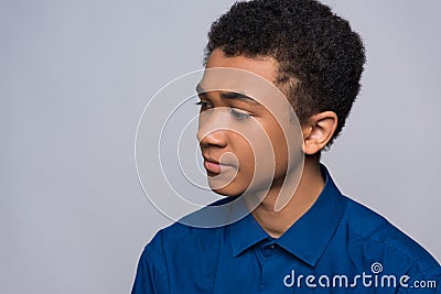 African American teenager in shirt is in turmoil. Stock Photo