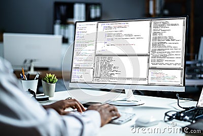 African American Web Coder At Computer. Software Programmer Stock Photo