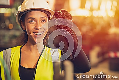 African American woman happy worker engineering working smile labor in heavy industry factory with good welfare concept Stock Photo