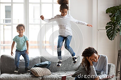 African American woman having problem with children upbringing Stock Photo