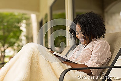 African American woman studing and reading the Bible. Stock Photo