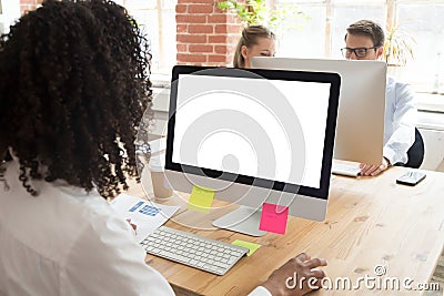 African American worker using computer at workplace Stock Photo