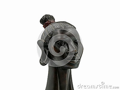 African antique black ebony head of a woman isolated on white background Stock Photo