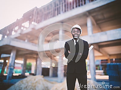 African architects engineer manager in suit work together in the inside the construction building site Stock Photo