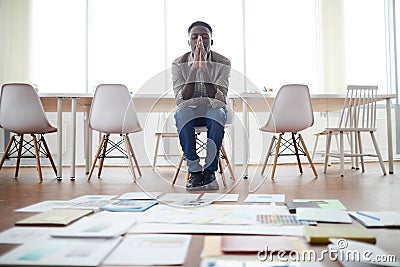 African Businessman Planning Project in Empty Office Stock Photo