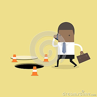 African businessman is talking on the phone without being careful of the hole on the ground. Vector Illustration
