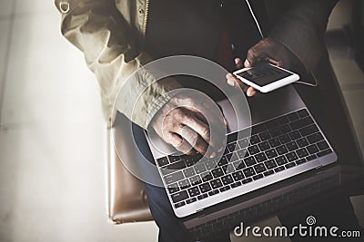 African Businessman Using Digital Laptop Smart Phone Concept Stock Photo