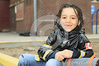 African child in the playground of a shool Stock Photo