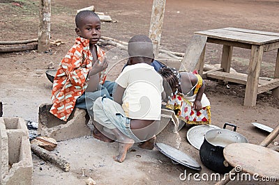 African children eat in groups. Editorial Stock Photo