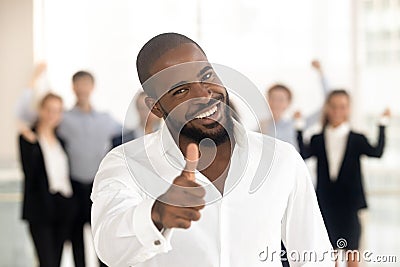 African client showing thumbs up feels satisfied received good service Stock Photo