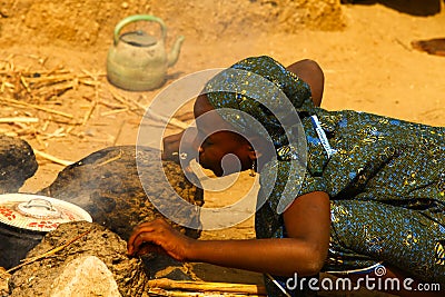 African Girl Cooking Editorial Stock Photo