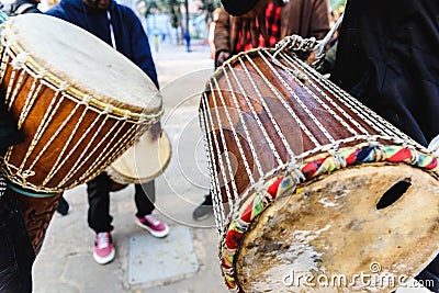 African drummers blowing their bongos on the street Stock Photo