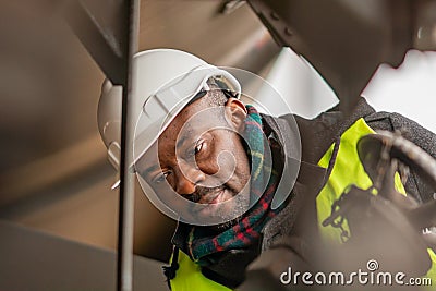 African engineer at work on construction site Stock Photo