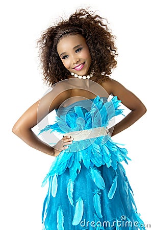 African Female Model Wearing Turquoise Feathered Dress, Big Afro Stock Photo