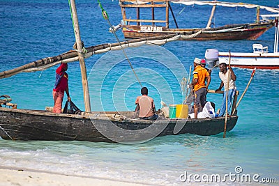 African fishermen on the boat. Coast of Zanzibar island Editorial Stock Photo