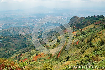 African landscape with houses and farms on the valley at the foothills of Uluguru Mountains in Morogoro Town, Tanzania Stock Photo