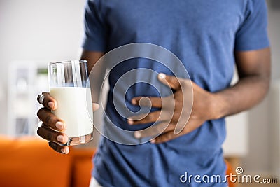 African Male Refusing Milk Stock Photo