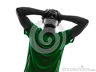 African man soccer player despair loosing silhouette Stock Photo