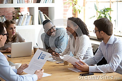 African manager speaking at diverse meeting sharing ideas at briefing Stock Photo