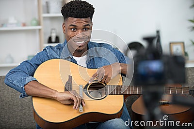 african musician playing guitar Stock Photo